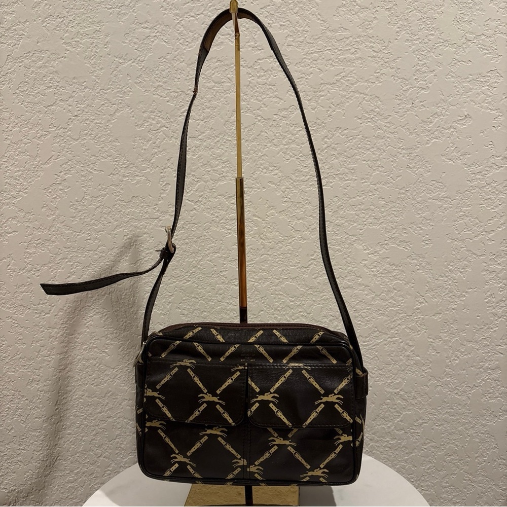 Longchamp Brown Leather
Crossbody